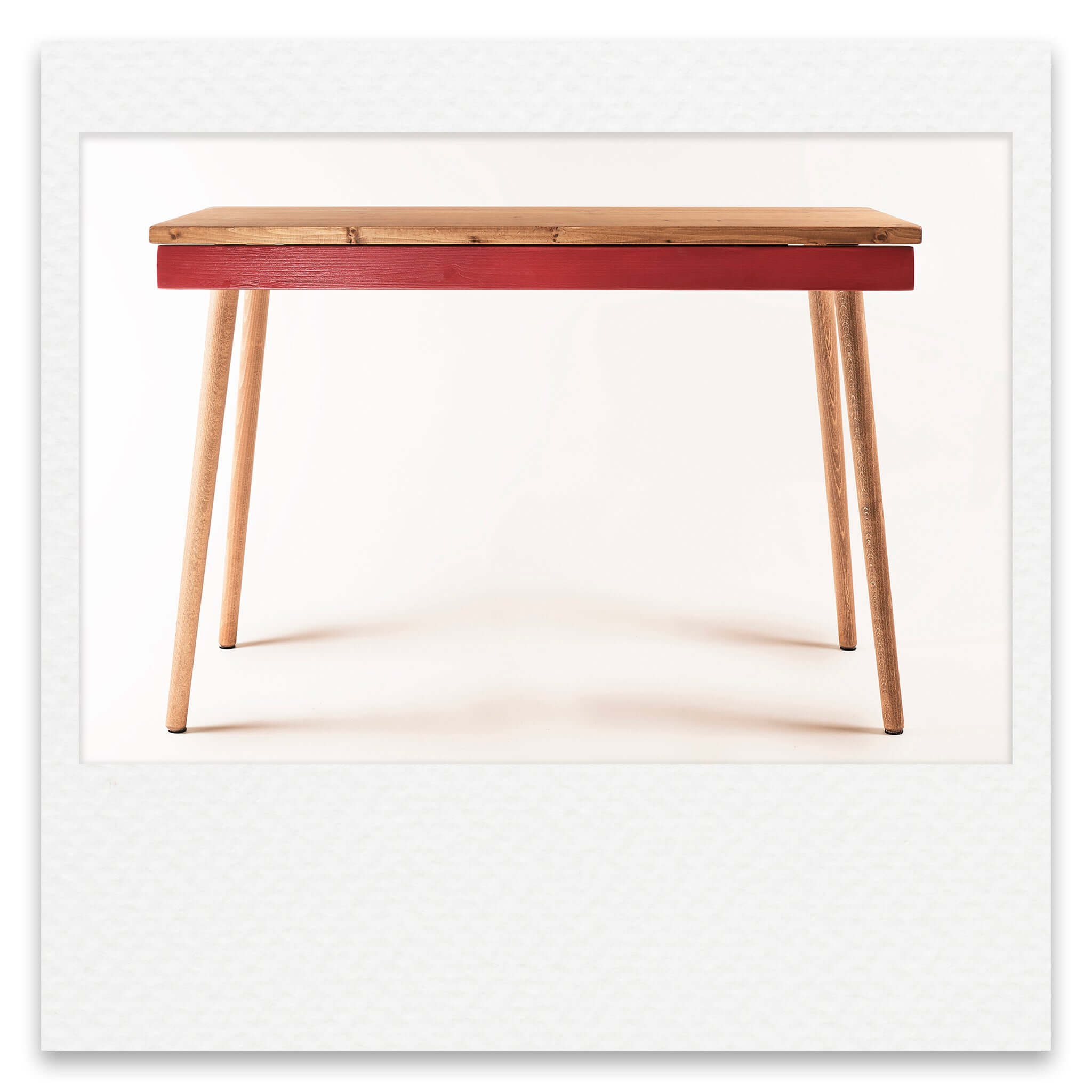 Simple Desk With Coloured Drawer and Wooden Legs
