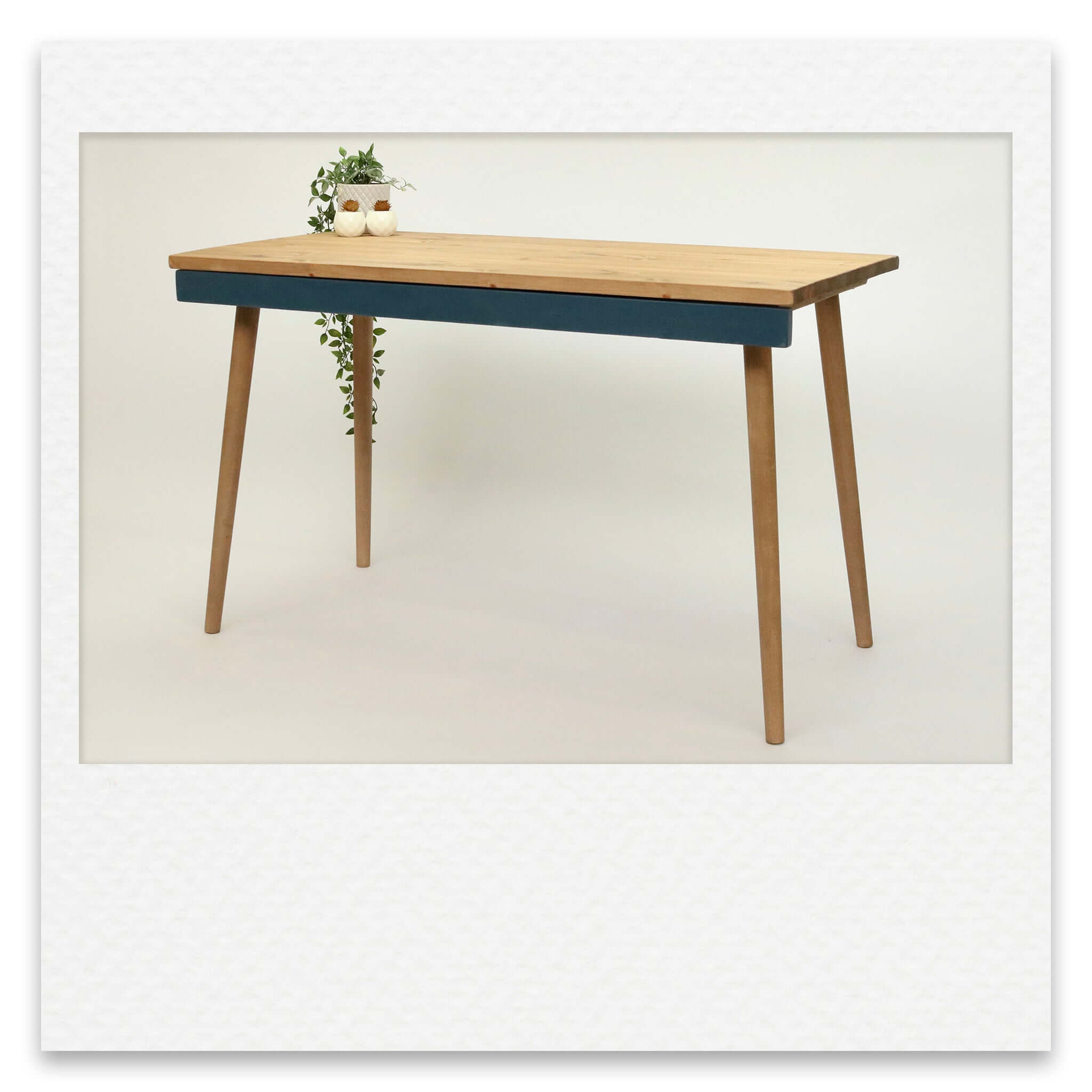 Simple Desk With Coloured Drawer and Wooden Legs